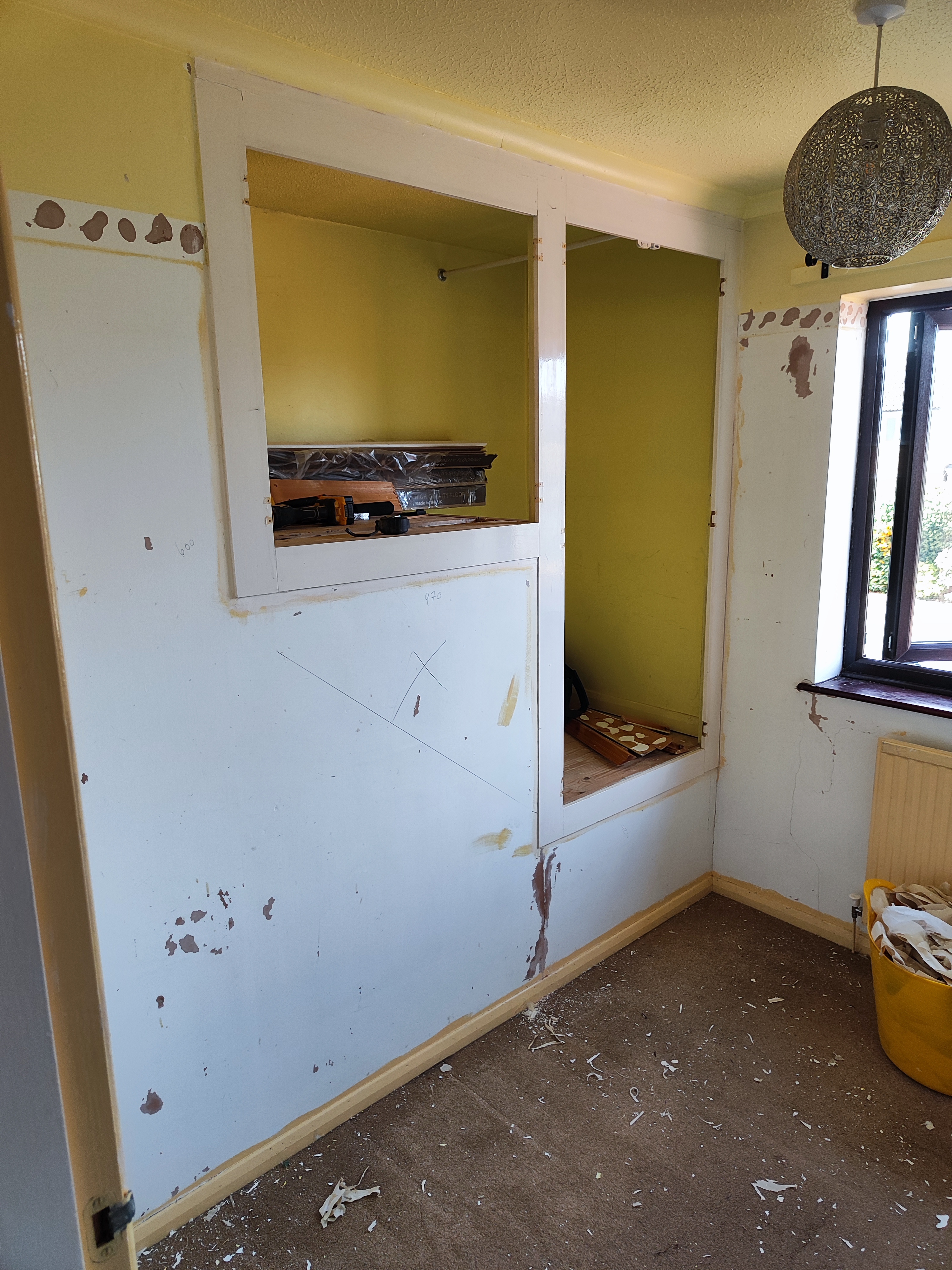Bedroom before built-in storage work